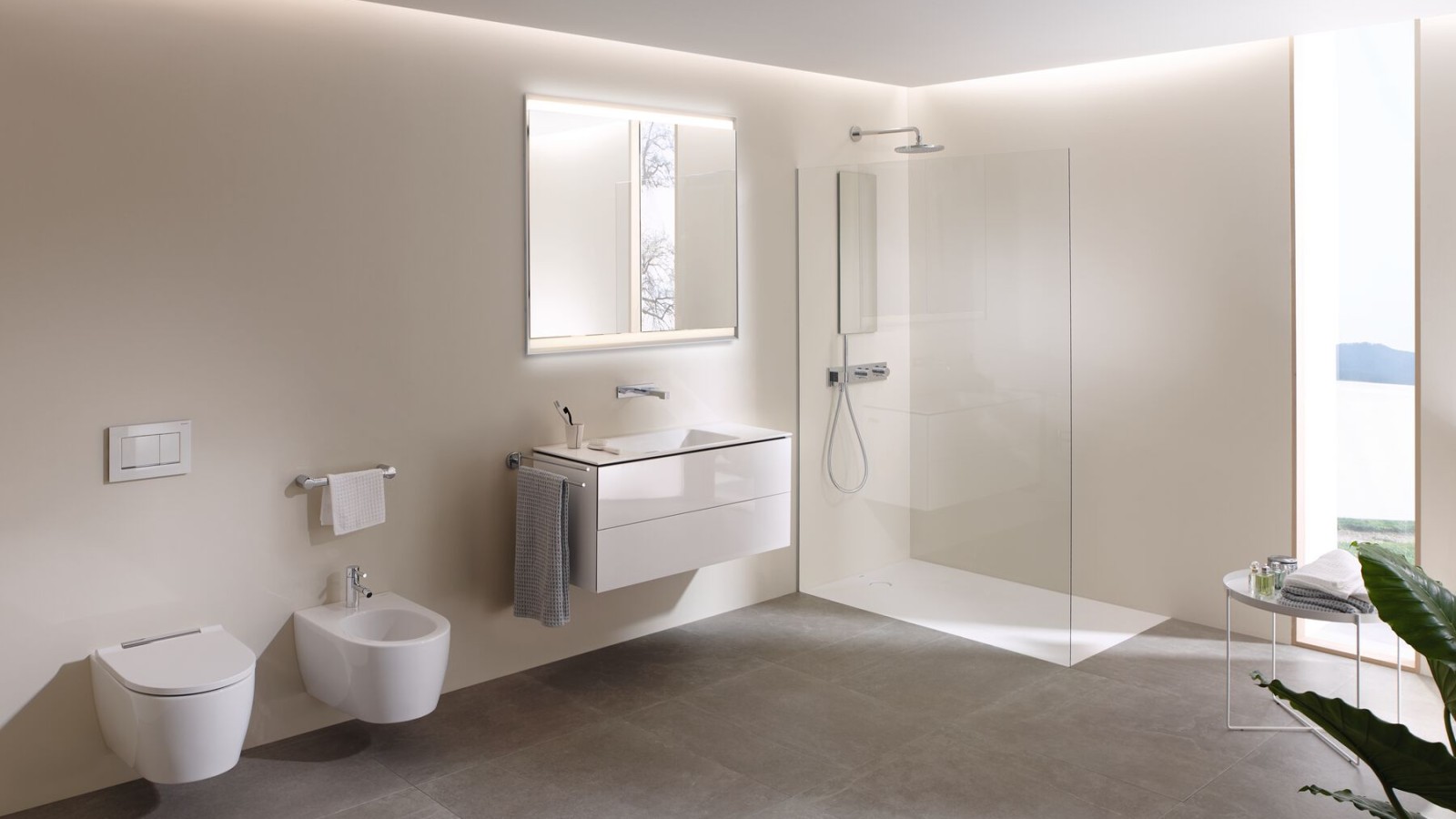 Ambiance d'une salle de bains avec WC lavant Geberit AquaClean Maïra, lavabo et meuble Geberit ONE (© Geberit) Ambiance d'une salle de bains avec WC lavant Geberit AquaClean Maïra, lavabo et meuble Geberit ONE (© Geberit)
