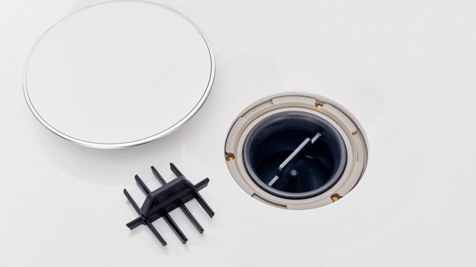 Peigne intégré dans le drain Peigne intégré dans le drain