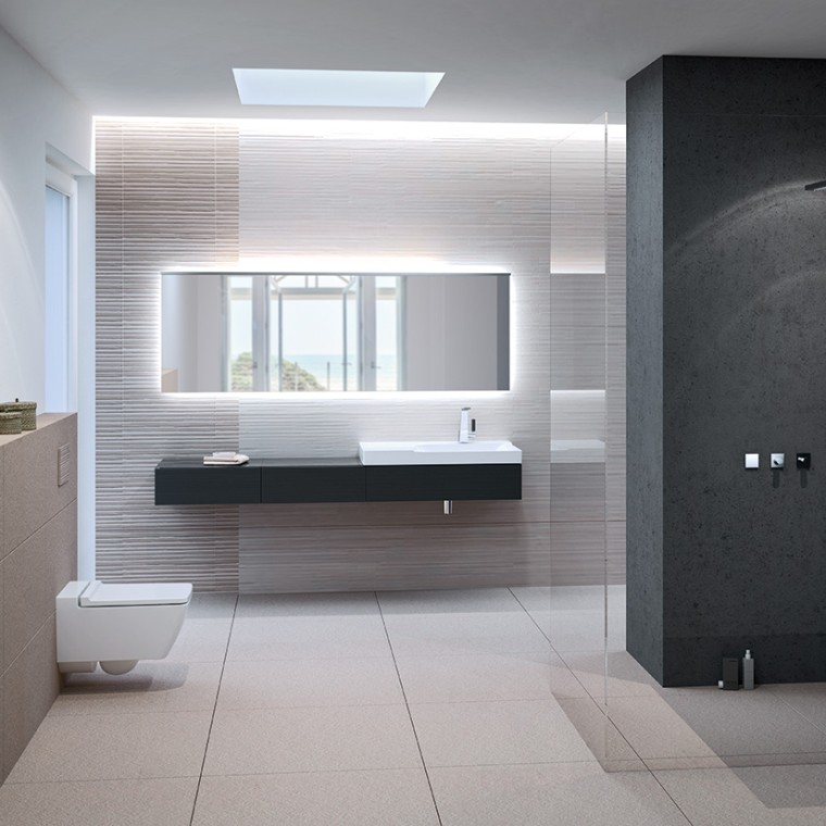 Salle de bains équipée d’un WC Geberit Xeno² sans rebord de rinçage, d’une plaque de déclenchement Sigma70 et d’un lavabo Salle de bains équipée d’un WC Geberit Xeno² sans rebord de rinçage, d’une plaque de déclenchement Sigma70 et d’un lavabo