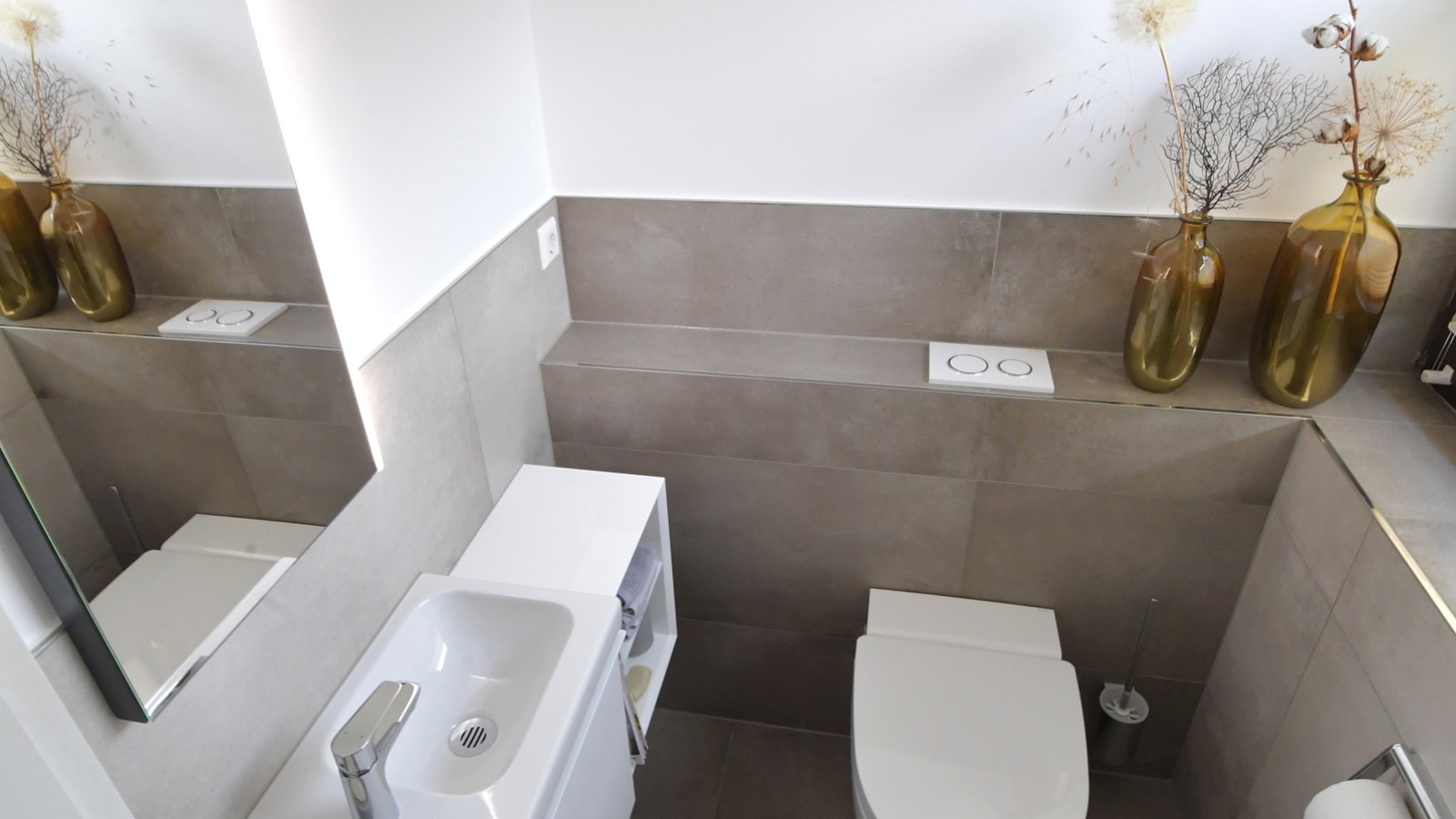 La salle de bains d'invités après la rénovation