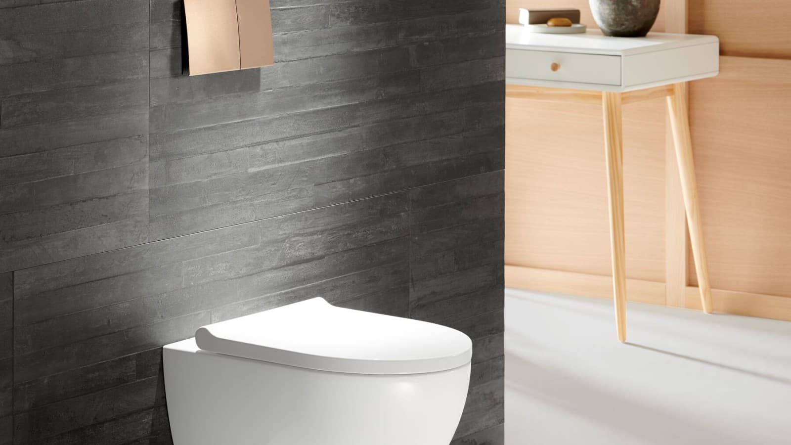 WC Geberit Acanto avec plaque de déclenchement Sigma70 or rouge WC Geberit Acanto avec plaque de déclenchement Sigma70 or rouge